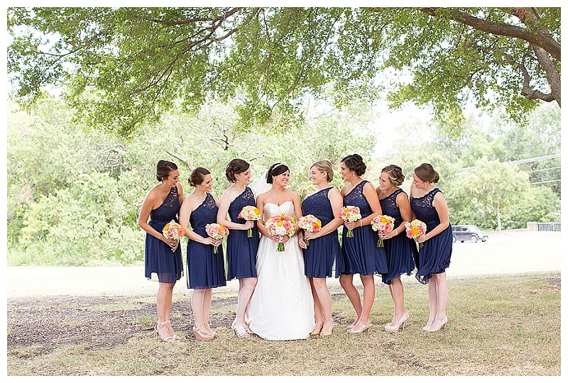 Coral, pink, peach, yellow, and green wedding flowers