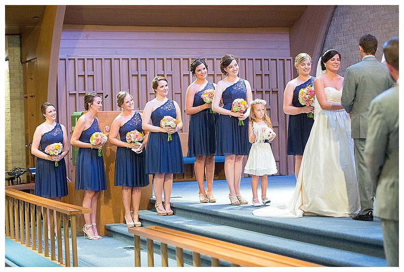 Coral, pink, peach, yellow, and green wedding flowers