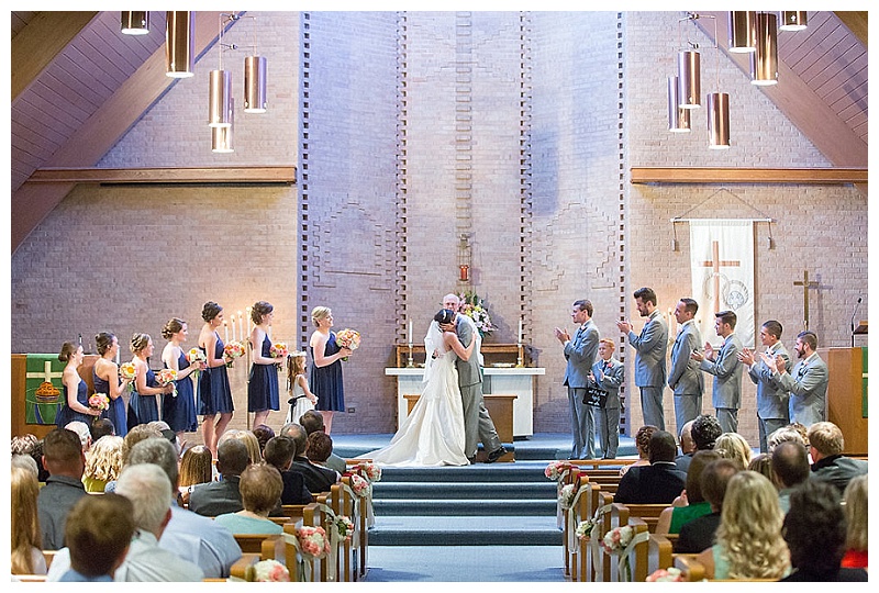 Coral, pink, peach, yellow, and green wedding flowers