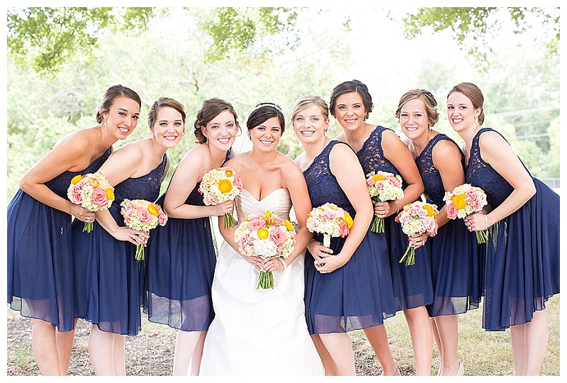 Coral, pink, peach, yellow, and green wedding flowers